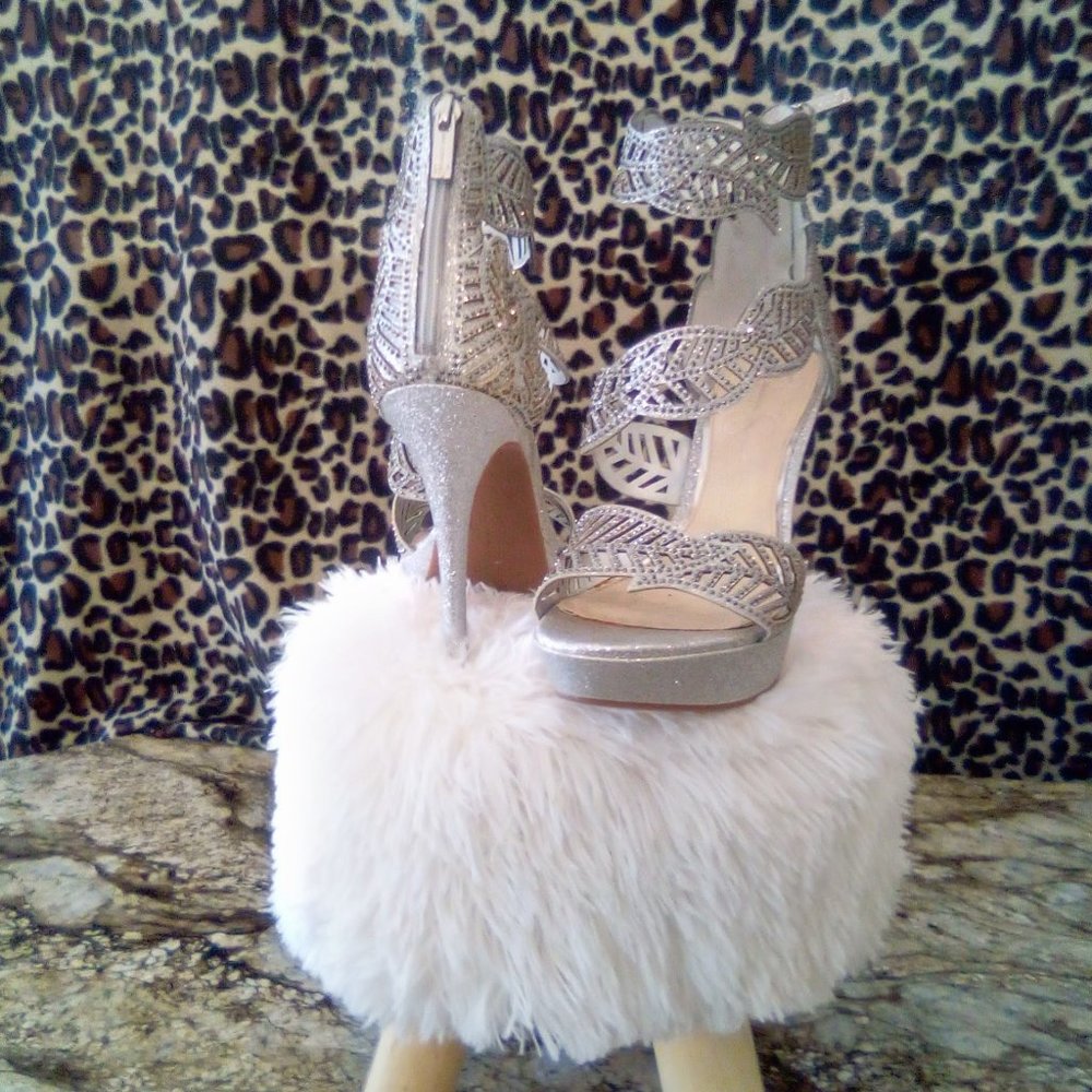 Silver Jessica Simpson Heels - Size 10 – $90 – Never worn.